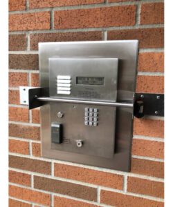 Intercome panel protected with a steel security bar.